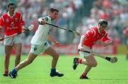 17 May 1998, Pat Ryan of Cork in action against Peter Queally of Waterford during the National GAA Hurling League Final match between Cork and Waterford at Semple Stadium in Thurles, Co Tipperary. Photo by Ray McManus/Sportsfile