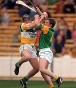 24 May 1998; Paudie Mulhare of Offaly in action against Sean Kealy of Meath during the Leinster GAA Senior Hurling Championship Quarter-Final match between Offaly and Meath at Croke Park in Dublin. Photo by Ray McManus/Sportsfile