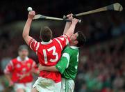 31 May 1998; Sean O'Farrell of Cork is tackled by Pa Carey of Limerick during the Munster Senior Hurling Championship Quarter-Final match between Limerick and Cork at the Gaelic Grounds in Limerick. Photo by Ray McManus/Sportsfile
