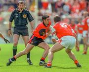 14 June 1998; Shane Mulholland of Down in action against Jarleth Burns of Armagh during the Ulster Senior Football Championship Quarter-Final match between Down and Armagh at St. Tiernach's Park, Clones. Photo by David Maher/Sportsfile