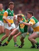 24 May 1998; Tommy Dowd of Meath in action against Cathal Daly of Offaly during the Leinster GAA Football Senior Championship Quarter-Final match between Meath and Offaly at Croke Park in Dublin. Photo by Ray McManus/Sportsfile