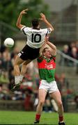 10 June 2001; Tom Nallen of Mayo in action against Eamonn O'Hara of Sligo during the Bank of Ireland Connacht Senior Football Championship Semi-Final match between Mayo and Sligo at MacHale Park in Castlebar, Mayo. Photo by Damien Eagers/Sportsfile
