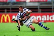 26 May 2001; Jan Cunningham of Dungannon is tackled by Derek Dillon of Cork Constitution during the AIB All-Ireland League Final match between Dungannon and Cork Constitution at Lansdowne Road in Dublin. Photo by Brendan Moran/Sportsfile
