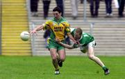 16 June 2001; Michael Hegarty of Donegal in action against Tom Brewster of Fermanagh during the Bank of Ireland All-Ireland Senior Football Championship Qualifier Round 1 match between Fermanagh and Donegal at Brewster Park in Enniskillen, Fermanagh. Photo by Damien Eagers/Sportsfile