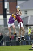 16 June 2001; Paul Conway of Westmeath gathers possession of a high-ball against Jack Berry of Wexford during the Bank of Ireland All-Ireland Senior Football Championship Qualifier Round 1 Replay match between Westmeath and Wexford at Cusack Park in Mullingar, Westmeath. Photo by Ray McManus/Sportsfile