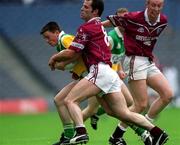 17 June 2001; Ronan Daly of Offaly is tackled by Anthony Coyne of Westmeath during the Leinster Junior Football Championship Semi-Final match between Offaly and Westmeath at Croke Park in Dublin. Photo by Ray McManus/Sportsfile