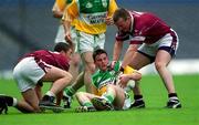 17 June 2001; Ronan Daly of Offaly is tackled by Gary Glennon, left, and Aidan Lyons of Westmeath during the Leinster Junior Football Championship Semi-Final match between Offaly and Westmeath at Croke Park in Dublin. Photo by Ray McManus/Sportsfile