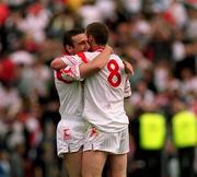 17 June 2001; Brendan McLaughlin and Cormac McAnallen of Tyrone celebrate their victory of the Bank of Ireland Ulster Senior Football Championship Semi-Final match between Tyrone and Derry at St Tiernach's Park in Clones, Monaghan. Photo by Damien Eagers/Sportsfile