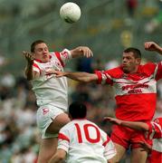 17 June 2001; Cormac McAnallen of Tyrone in action against Anthony Tohill of Derry during the Bank of Ireland Ulster Senior Football Championship Semi-Final match between Tyrone and Derry at St Tiernach's Park in Clones, Monaghan. Photo by Damien Eagers/Sportsfile