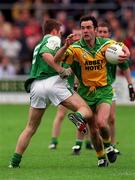 16 June 2001; Damien Diver of Donegal in action against Martin McGrath of Fermanagh during the Bank of Ireland All-Ireland Senior Football Championship Qualifier Round 1 match between Fermanagh and Donegal at Brewster Park in Enniskillen, Fermanagh. Photo by Damien Eagers/Sportsfile