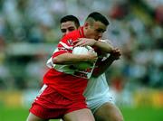 17 June 2001; Patrick Bradley of Derry in action against Michael McGee of Tyrone during the Bank of Ireland Ulster Senior Football Championship Semi-Final match between Tyrone and Derry at St Tiernach's Park in Clones, Monaghan. Photo by Damien Eagers/Sportsfile
