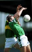 17 June 2001; Jason Stokes of Limerick contests a high-ball against Donal Daly of Kerry during the Bank of Ireland Munster Senior Football Championship Semi-Final match between Kerry and Limerick at Fitzgerald Stadium in Killarney, Kerry. Photo by Brendan Moran/Sportsfile
