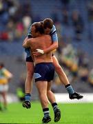 17 June 2001; Vinny Murphy of Dublin celebrates with team-mate Ken Darcy, top, following the Bank of Ireland Leinster Senior Football Championship Semi-Final match between Dublin and Offaly at Croke Park in Dublin. Photo by Ray McManus/Sportsfile