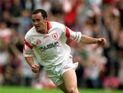 17 June 2001; Brian Dooher of Tyrone turns to celebrate after scoring his side's second goal during the Bank of Ireland Ulster Senior Football Championship Semi-Final match between Tyrone and Derry at St Tiernach's Park in Clones, Monaghan. Photo by Damien Eagers/Sportsfile