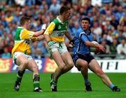 17 June 2001; Colin Moran of Dublin in action against Ger Rafferty, centre, and Cathal Daly of Offaly during the Bank of Ireland Leinster Senior Football Championship Semi-Final match between Dublin and Offaly at Croke Park in Dublin. Photo by Brian Lawless/Sportsfile
