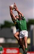 17 June 2001; Eamon MacGearailt of Kerry contests a high ball against Damien Reidy of Limerick during the Bank of Ireland Munster Senior Football Championship Semi-Final match between Kerry and Limerick at Fitzgerald Stadium in Killarney, Kerry. Photo by Brendan Moran/Sportsfile