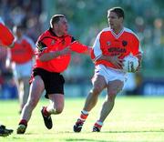 9 June 2001; Kieran McGeeney of Armagh in action against Brendan Grant of Down during the Bank of Ireland All-Ireland Senior Football Championship Qualifier Round 1 match between Down and Armagh at Casement Park in Belfast. Photo by Ray McManus/Sportsfile