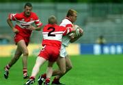 17 June 2001; Owen Mulligan of Tyrone in action against Gareth Doherty of Derry during the Bank of Ireland Ulster Senior Football Championship Semi-Final match between Tyrone and Derry at St Tiernach's Park in Clones, Monaghan. Photo by Damien Eagers/Sportsfile