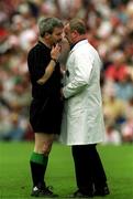 17 June 2001; Referee Paddy Russell discusses a decision with a linesman during the Bank of Ireland Ulster Senior Football Championship Semi-Final match between Tyrone and Derry at St Tiernach's Park in Clones, Monaghan. Photo by Damien Eagers/Sportsfile