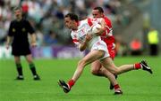 17 June 2001; Pascal Canavan of Tyrone is tackled by Gary Coleman of Derry during the Bank of Ireland Ulster Senior Football Championship Semi-Final match between Tyrone and Derry at St Tiernach's Park in Clones, Monaghan. Photo by Damien Eagers/Sportsfile