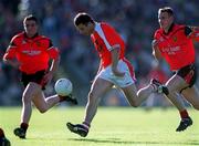 9 June 2001; Paul McGrane of Armagh makes a break through the Down defence during the Bank of Ireland All-Ireland Senior Football Championship Qualifier Round 1 match between Down and Armagh at Casement Park in Belfast. Photo by Ray McManus/Sportsfile