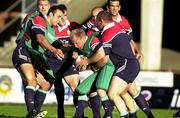 20 June 2001; Neil Back is tackled by Robin McBryde and Danny Grewcock, left, during a British and Irish Lions Training Session at the Manly Oval in New South Wales, Australia. Photo by Matt Browne/Sportsfile