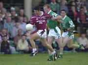 23 June 2001; Brian Morley of Westmeath in action against John Quane of Limerick during the Bank of Ireland All-Ireland Senior Football Championship Qualifier Round 2 match between Limerick and Westmeath at the Gaelic Grounds in Limerick. Photo by Brendan Moran/Sportsfile