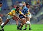 17 June 2001; Colin Moran of Dublin in action against Sean Grennan, left, and Finbar Cullen of Offaly during the Bank of Ireland Leinster Senior Football Championship Semi-Final match between Dublin and Offaly at Croke Park in Dublin. Photo by Ray McManus/Sportsfile