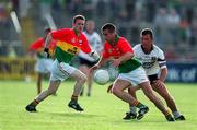 23 June 2001; Joe Byrne of Carlow in action against Sean Davey of Sligo during the Bank of Ireland All-Ireland Senior Football Championship Qualifier Round 2 match between Carlow and Sligo at Dr Cullen Park in Carlow. Photo by Damien Eagers/Sportsfile