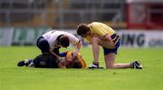 24 June 2001; Joe Considine of Clare receives medical attention during the Bank of Ireland Munster Senior Football Championship Semi-Final match between Cork and Clare in Pairc Ui Chaoimh in Cork. Photo by Brendan Moran/Sportsfile
