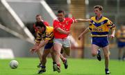 24 June 2001; Mark O'Connell of Clare in action against Joe Kavanagh of Cork during the Bank of Ireland Munster Senior Football Championship Semi-Final match between Cork and Clare in Pairc Ui Chaoimh in Cork. Photo by Brendan Moran/Sportsfile