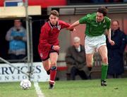 27 March 1995; Kevin Gallen of England in action against Gary Breen of Republic of Ireland during the UEFA U21 Championship Qualifier between Republic of Ireland and England at Dalymount Park in Dublin. Photo by Ray McManus/Sportsfile