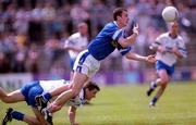 24 June 2001; Thomas Prior of Cavan in action against Raymond Ronaghan of Monaghan during the Bank of Ireland Ulster Senior Football Championship Semi-Final match between Monaghan and Cavan at St Tiernach's Park in Clones, Monaghan. Photo by David Maher/Sportsfile