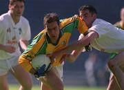 24 June 2001; Meath goalkeeper Cormac Sullivan is tackled by Dermot Earley of Kildare during the Bank of Ireland Leinster Senior Football Championship Semi-Final match between Meath and Kildare at Croke Park in Dublin. Photo by Damien Eagers/Sportsfile