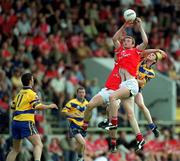 24 June 2001; Nicholas Murphy and Ciaran O'Sullivan of Cork competes for a high ball against Joe Considine of Clare during the Bank of Ireland Munster Senior Football Championship Semi-Final match between Cork and Clare in Pairc Ui Chaoimh in Cork. Photo by Brendan Moran/Sportsfile