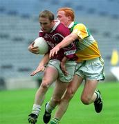 17 June 2001; Alan Daly of Westmeath in action against Conor Evans of Offaly during the Leinster Junior Football Championship Semi-Final match between Offaly and Westmeath at Croke Park in Dublin. Photo by Ray Lohan/Sportsfile