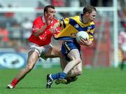 24 June 2001; John Miskella of Cork in action against Michael O'Shea of Clare during the Bank of Ireland Munster Senior Football Championship Semi-Final match between Cork and Clare in Pairc Ui Chaoimh in Cork. Photo by Brendan Moran/Sportsfile