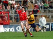 24 June 2001; Graham Canty of Cork in action against Peadar McMahon of Clare during the Bank of Ireland Munster Senior Football Championship Semi-Final match between Cork and Clare in Pairc Ui Chaoimh in Cork. Photo by Brendan Moran/Sportsfile