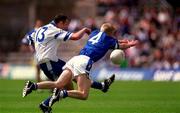 24 June 2001; Declan Smyth of Monaghan in action against Michael Bridges of Cavan during the Bank of Ireland Ulster Senior Football Championship Semi-Final match between Monaghan and Cavan at St Tiernach's Park in Clones, Monaghan. Photo by David Maher/Sportsfile