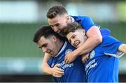 14 May 2016; Crumlin United's Gregory Moorhouse, right, celebrates with team-mates Carl Forsyth, left, and Luke Kelly after scoring his side's first goal of the game. FAI Intermediate Cup Final, Crumlin United v Letterkenny Rovers. Aviva Stadium, Dublin. Picture credit: Ramsey Cardy / SPORTSFILE