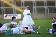 14 May 2016; 9 year old Kathlyn Timmons, who made her holy communion earlier in the day, waits for her father Mark during the warm-down after the Leinster GAA Football Senior Championship, Round 1, Laois v Wicklow in O'Moore Park, Portlaoise, Co. Laois. Photo by Matt Browne/Sportsfile