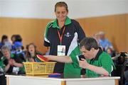 11 June 2010; Pauric Heslin, from Sligo, Connaught, along with coach Jackie Lynch, in action during the 2010 Special Olympics Ireland Games. Tailteann Centre, Mary Immaculate College, Limerick. Picture credit: Diarmuid Greene / SPORTSFILE