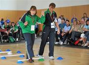 11 June 2010; Grainne Fitzgerald, from Cloonamahon, Co. Sligo, with her coach Susan Duncan, in action during Motor Activity Training Programme at the 2010 Special Olympics Ireland Games. Tailteann Centre, Mary Immaculate College, Limerick. Picture credit: Diarmuid Greene / SPORTSFILE