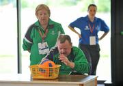 11 June 2010; Brendan Sheridan, from Clarenbridge, Co. Galway, watched by coach Mary Lynch, in action during Motor Activity Training Programme at the 2010 Special Olympics Ireland Games. Tailteann Centre, Mary Immaculate College, Limerick. Picture credit: Diarmuid Greene / SPORTSFILE