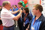 11 June 2010; Maurice Redmond, Chairman Special Olympics Eastern Region, presents his daughter Nicole, Eastern Team 15, with her second place medal in the Team Bowling event during the second day of the 2010 Special Olympics Ireland Games. Funworld, Ennis Road, Limerick. Picture credit: Stephen McCarthy / SPORTSFILE
