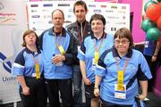 11 June 2010; Tipperary hurler Conor O'Mahony with Eastern Team 9, from left, Christine Traynor, Martin Morrissey Jennifer Clarke and Rachel Coen after receiving their medals for 5th place in the Team Bowling event during the second day of the 2010 Special Olympics Ireland Games. Funworld, Ennis Road, Limerick. Picture credit: Stephen McCarthy / SPORTSFILE