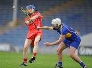 12 June 2010; Rachel Moloney, Cork, has her shot blocked by Mary Ryan, Tipperary. Gala All-Ireland Senior Camogie Championship, Tipperary v Cork, Semple Stadium, Thurles, Co. Tipperary. Picture credit: Brendan Moran / SPORTSFILE