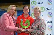 12 June 2010; Cork midfielder Gemma O'Connor, is presented with the Gala Performance of Award by Joan O'Flynn, right, President, Cumann Camogaiochta na nGael, Denise Lord, Customer Service Manager, Gala,. Gala All-Ireland Senior Camogie Championship, Tipperary v Cork, Semple Stadium, Thurles, Co. Tipperary. Picture credit: Brendan Moran / SPORTSFILE