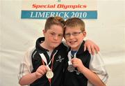 12 June 2010; Dara Friel, left, and Dean Black, both from Strabane, Co. Tyrone, celebrate after winning silver medals in the Division 1 Bocce Doubles Finals at 2010 Special Olympics Ireland Games. Limerick Racecourse, Patrickswell, Co. Limerick. Picture credit: Diarmuid Greene / SPORTSFILE