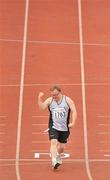 12 June 2010; Martin Myles, from Breffni, Cavan, celebrates as he crosses the finish line after the 400m Run, division 127, at the 2010 Special Olympics Ireland Games. University of Limerick, Limerick. Picture credit: Diarmuid Greene / SPORTSFILE